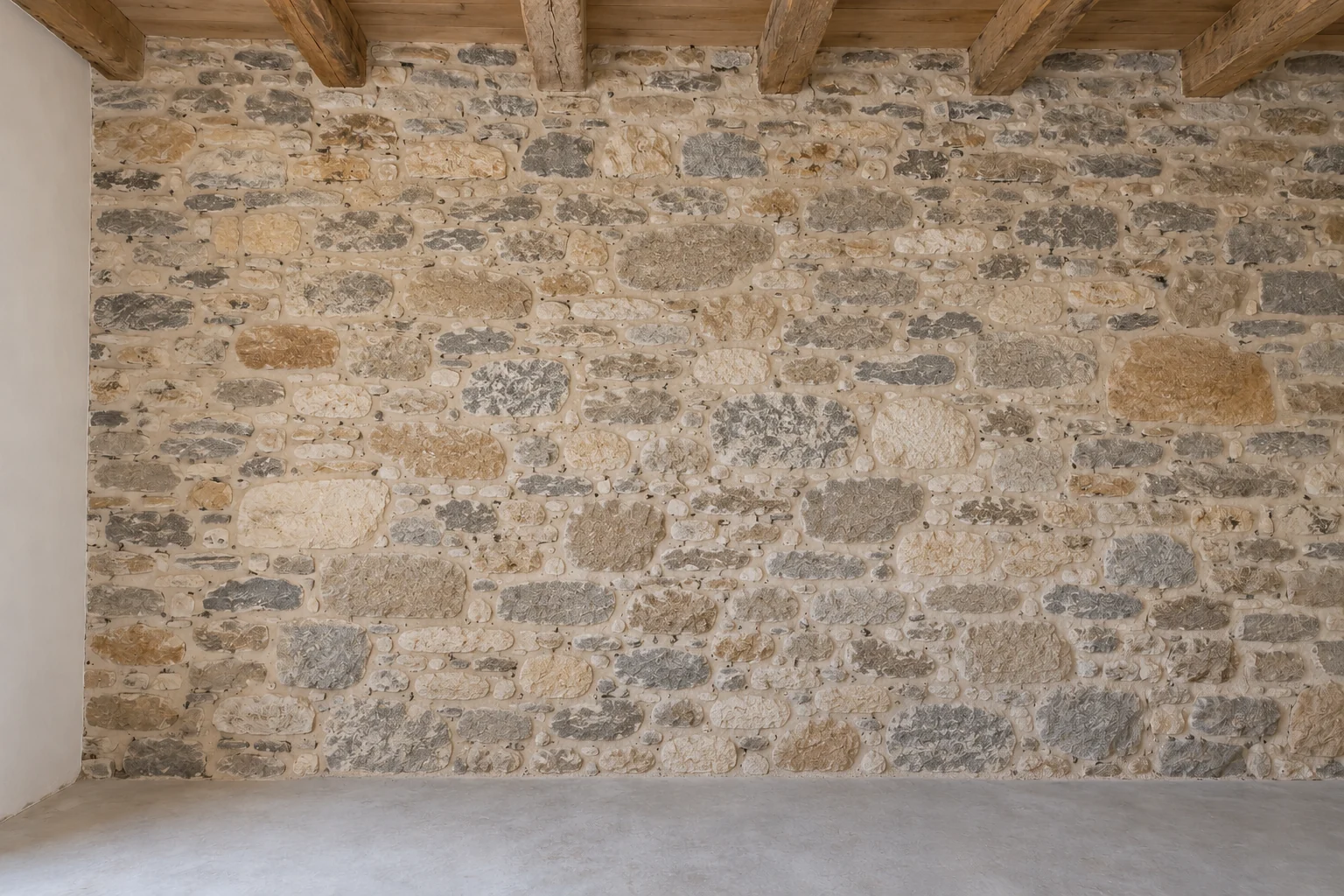 Mur porteur en pierre avant la création d’une ouverture intérieure